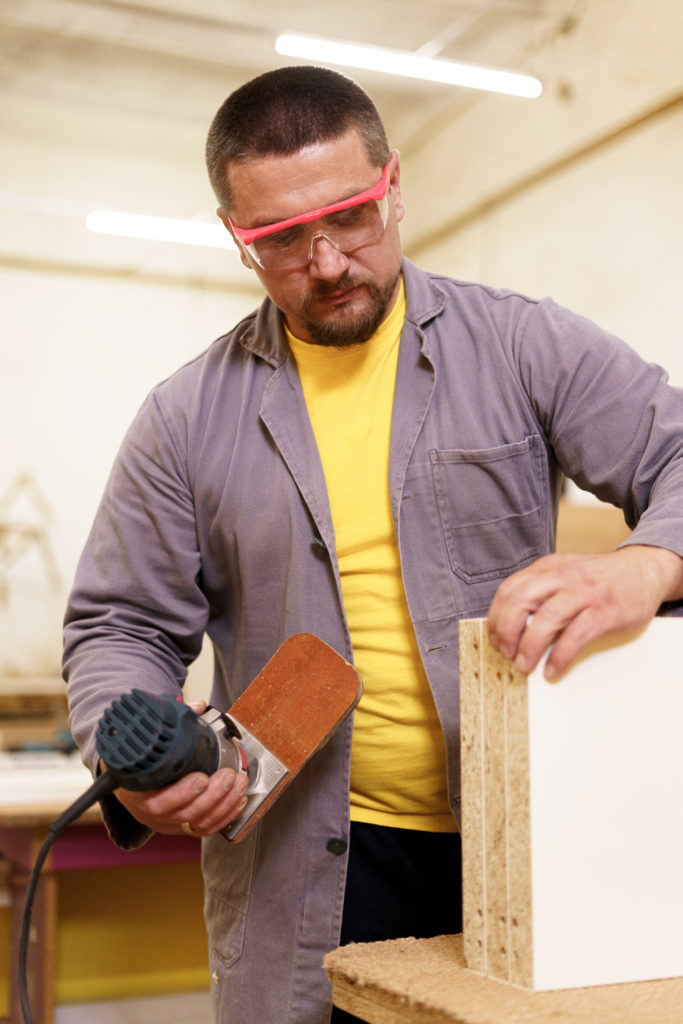 service worker using industrial power tools